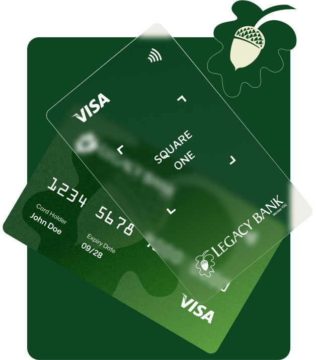 Legacy Bank personal banking cards with acorn on a leaf at top right
